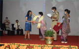 presenting token of live to children’s by Dr. E. Indira Devi